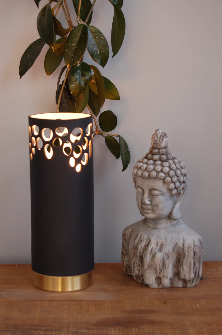 Artistic lamp and Buddha sculpture display