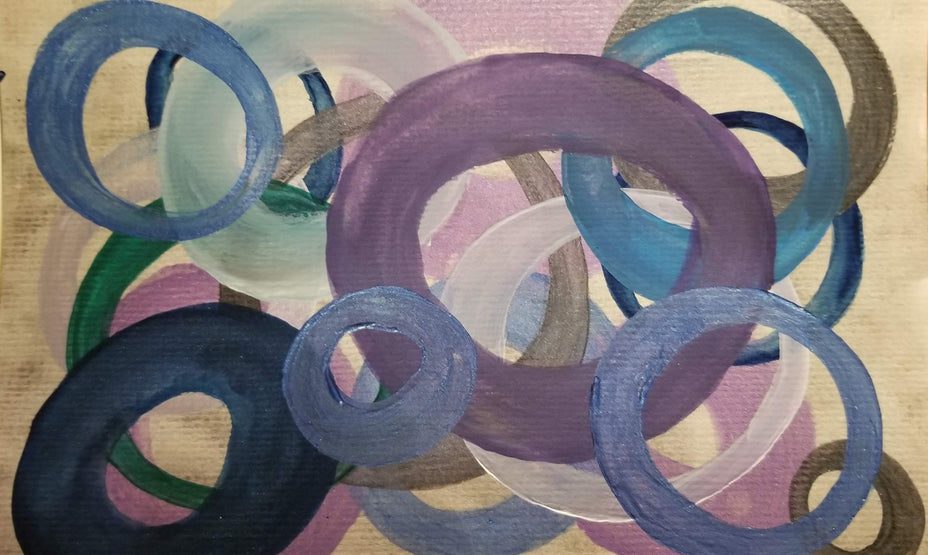 Colorful abstract circles overlapping on canvas