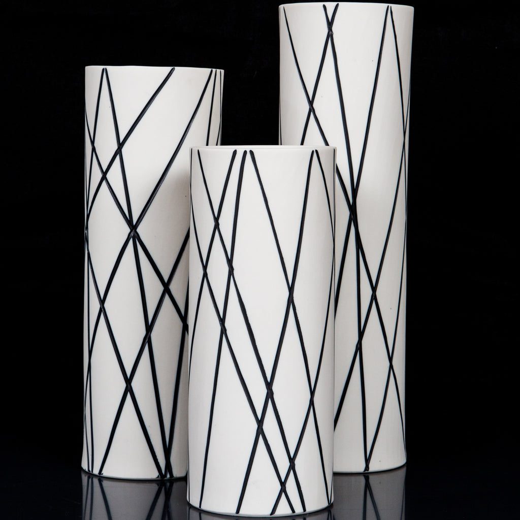 Tall vases featuring crisscross patterns