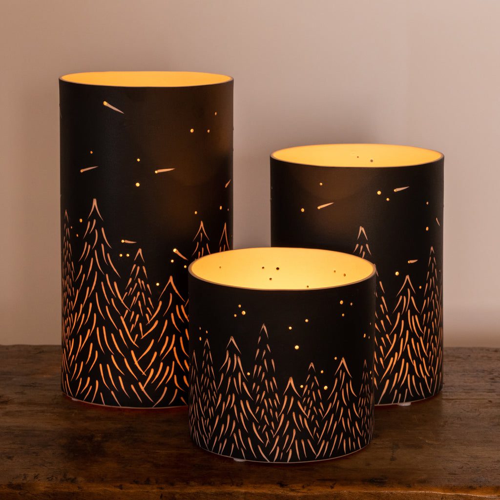 Set of three glowing lanterns