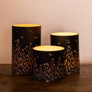 Decorative forest-themed candle holders