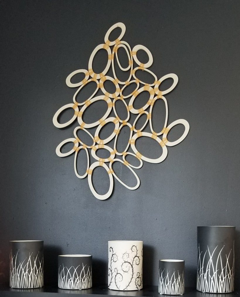 Abstract wall art with decorative candles