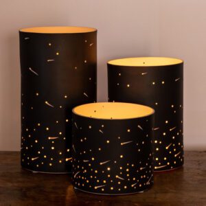 Black lanterns with starry perforations