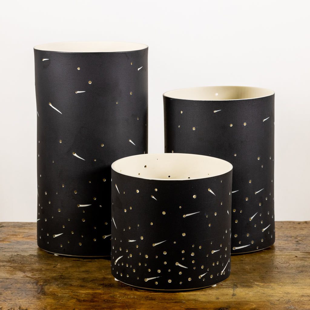 Decorative black vases with white speckles