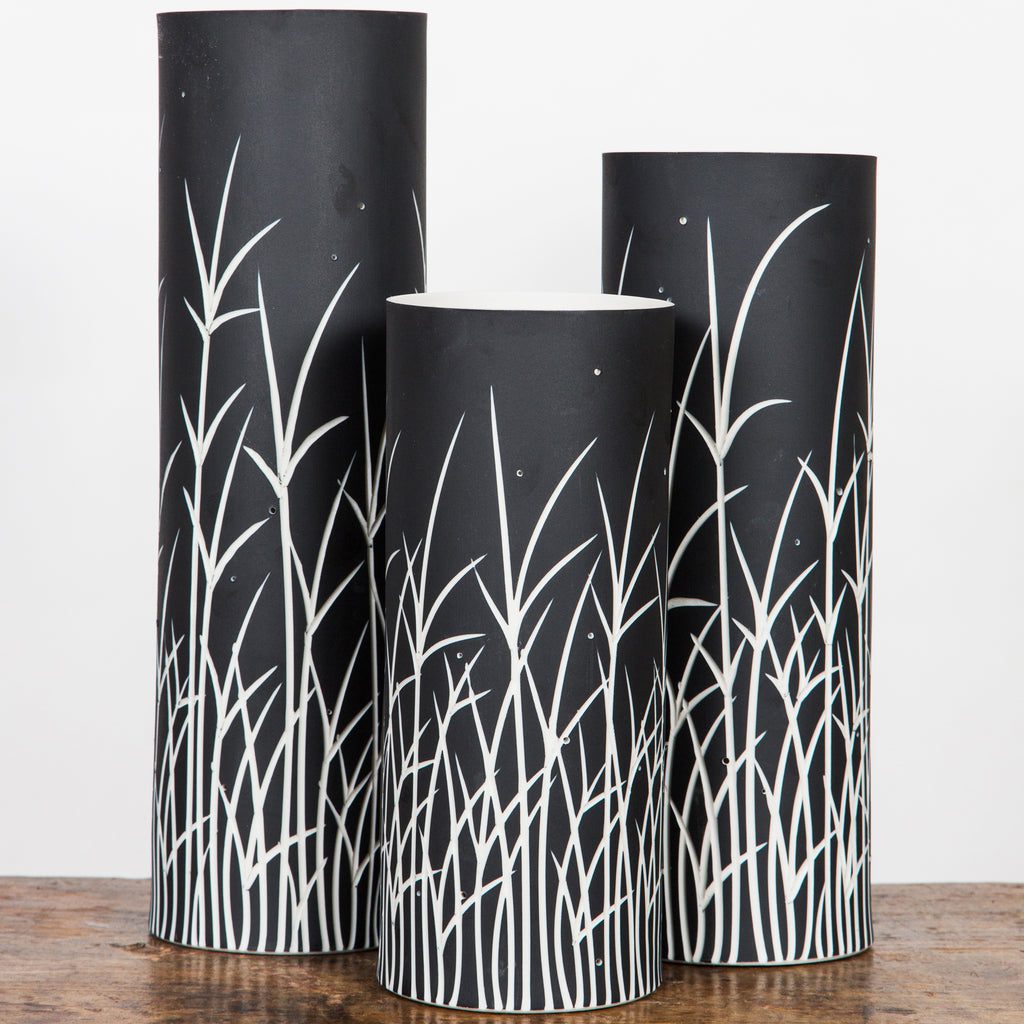 Decorative vases featuring abstract grass motif