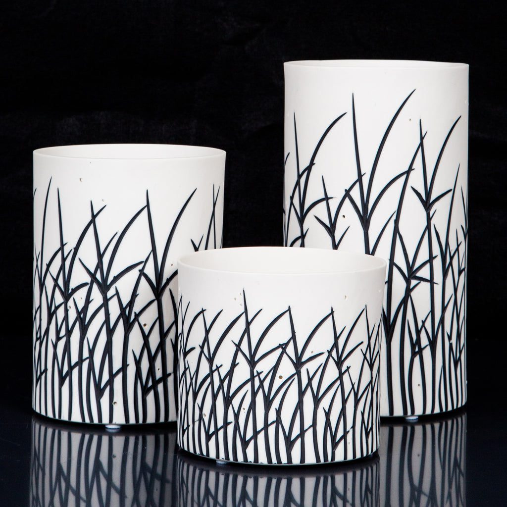 White vases with black grass design