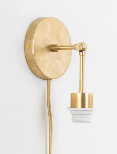 Minimalist gold wall light fixture