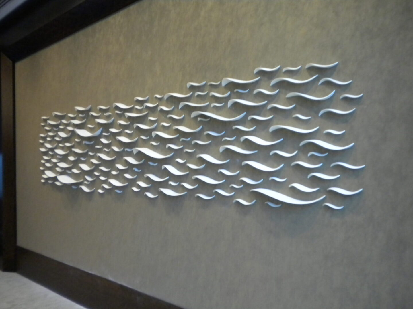 Abstract wall art with flowing shapes