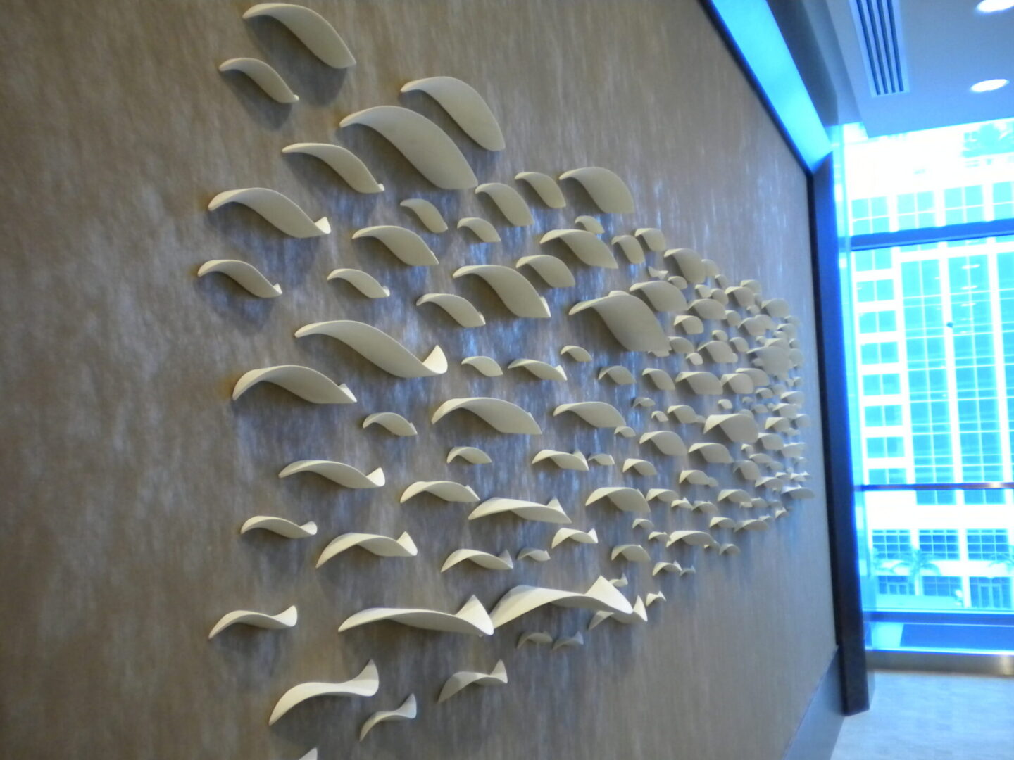 Abstract wall art installation in office