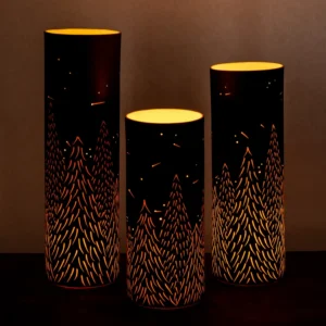 Warm-lit cylindrical lamps on dark background