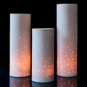 Three white lamps with starry light pattern